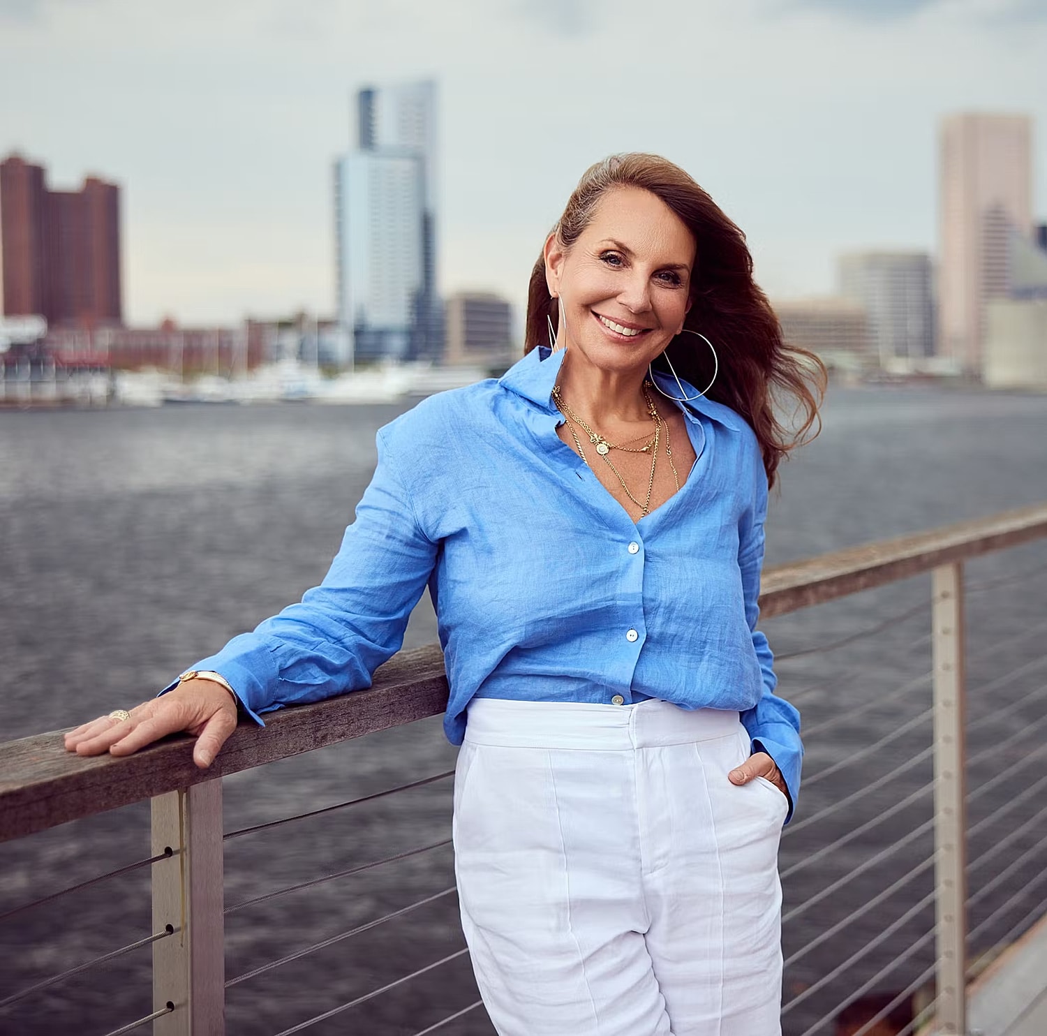 Model in brown swimwear posing confidently.