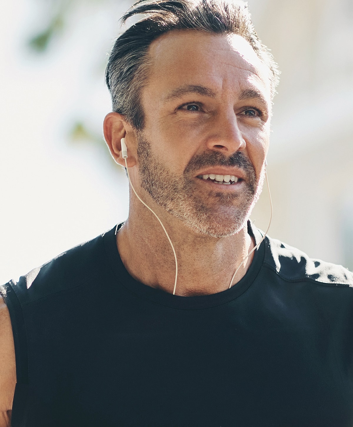 Model in brown swimwear posing confidently.