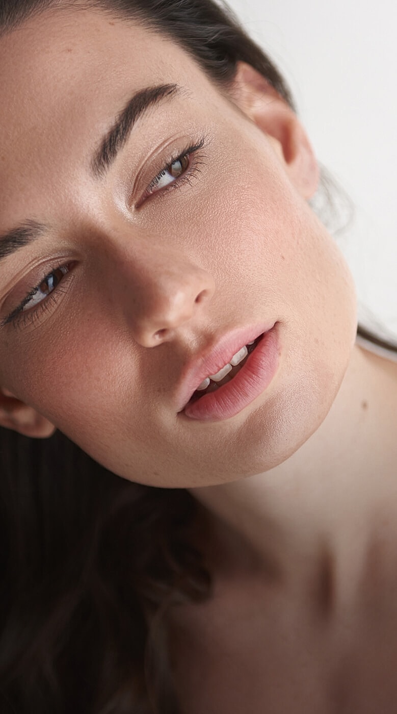 Close-up of a woman's face and lips.