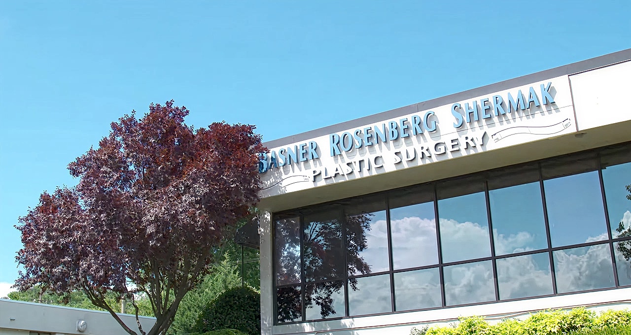 Woman speaking in an office setting.